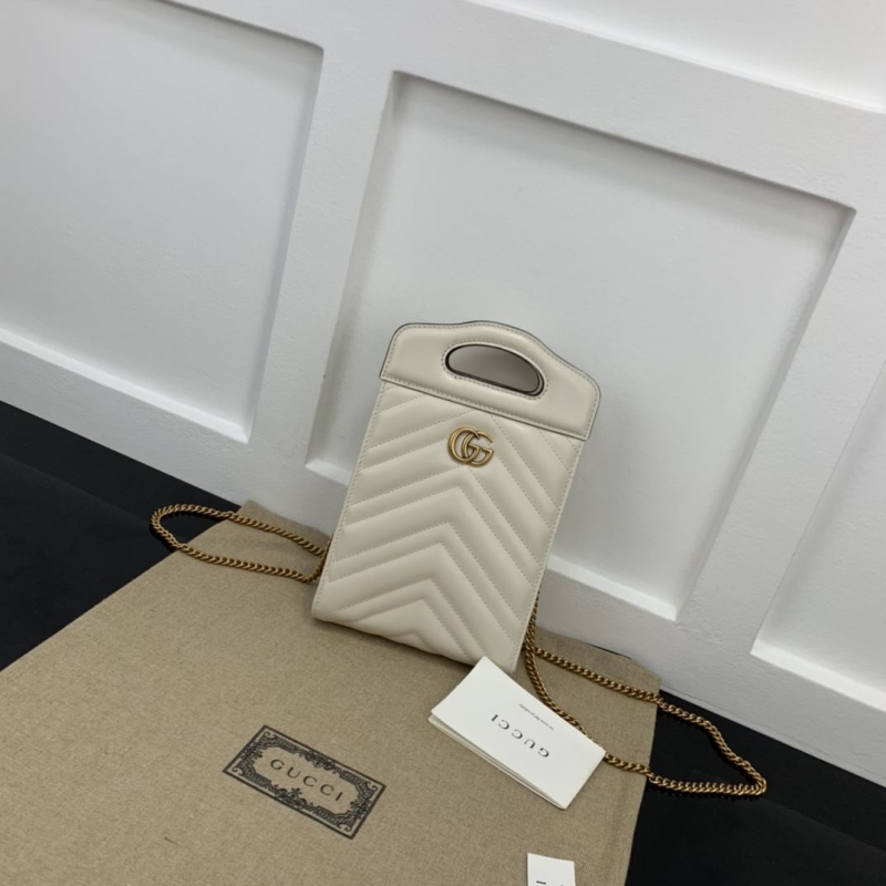 G*u*i top handle bags